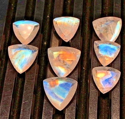 AAAAAA Mazing Rainbow Moonstone Lot Trillion Shape Faceted Cut Multi Fire 10-12M - Image 1 of 4