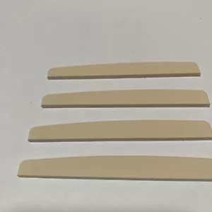 one Genuine new CF Martin 12 Inch Radius Micarta Shaped Acoustic Guitar Saddle - Picture 1 of 4