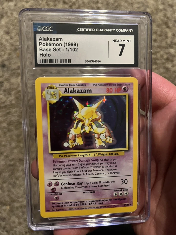 2000 Pokemon Base Set 2 Rare Holo Alakazam 1/130 Near Mint CGC 7 - Image 1 of 1
