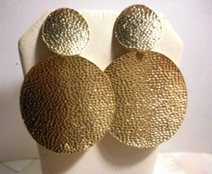 Gold tone dimpled double circle chandelier earrings. - Picture 1 of 7