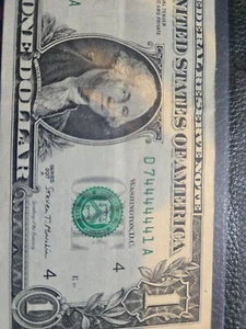 fancy serial number 1 dollar bill near solid - Picture 1 of 3