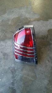 05-07 Chrysler 300 🚘 Left/driver side Tail Light housing(chrome Trimming) - Picture 1 of 3