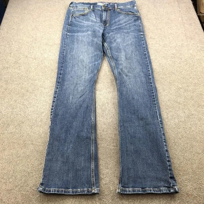 Pantalones de mezclilla Wrangler retro para hombre 36x34 azul ajustados corte bota lavado medio occidental Foto 1 de 4