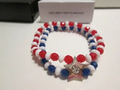 BRAZALETE AVON LADY LIBERTY ELÁSTICO ROJO BLANCO AZUL CON ACENTO DE ESTRELLAS Foto 1 de 4