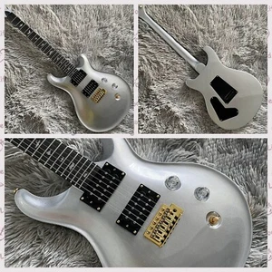 Guitarra Eléctrica PRS Metálica Plateada Pastillas HH Puente Trémolo Piezas Doradas - Imagen 1 de 6
