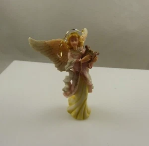 Angel holding a harp plastic or resin vintage Christmas ornament xmas - Picture 1 of 7
