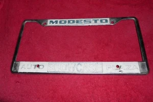 Marco de cubierta de placa de distribuidor Modesto de exhibición de automóviles Plaza de colección - Imagen 1 de 2