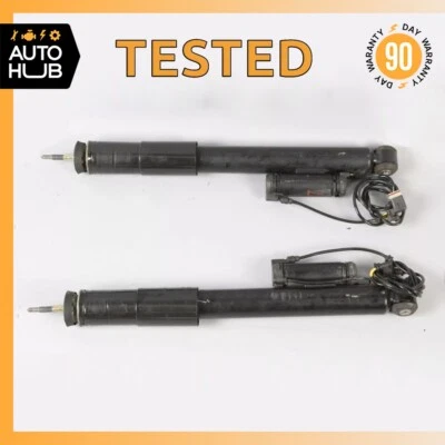 03-11 Juego Amortiguador Puntal Trasero Izquierdo y Derecho Mercedes W211 E63 CLS55 AMG Fabricante de Equipo Original Foto 1 de 4