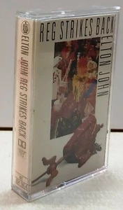 03853 MUSICASSETTA - ELTON JOHN - Reg Strike Back - Rocket Record Company 1988 - Picture 1 of 4