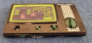 Tomy Knight's Mission Pocket Arcade Mecánico Juego Portátil - Imagen 1 de 5