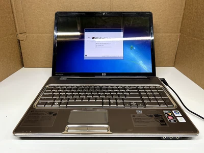 HP Pavilion D7‐1243CL | AMD Turion X2 RM‐72 | 4GB | 160 + 500GB HDD | Win 7 pro Foto 1 de 4