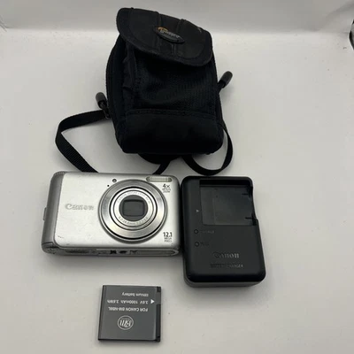 Canon PowerShot A3100 IS 12.1MP Digital Camera Silver Battery And Charger - Image 1 of 4