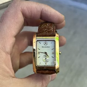 Mercedes Benz Uhr Goldton Swiss 992.505 Glasbruch wie besehen - Bild 1 von 3