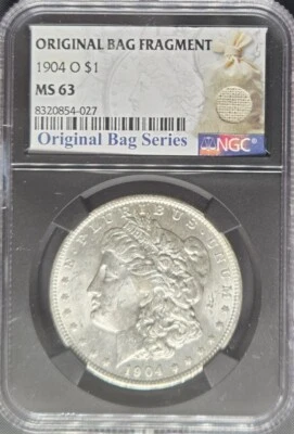 Dólar de plata Morgan 1886-P $1 - NGC MS63 - Fragmento de bolsa original Foto 1 de 4