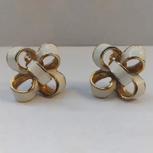 Donald Stannard Gold Tone Ivory Colored Enamel Ribbon Clip On 1" Earrings  - Picture 1 of 21