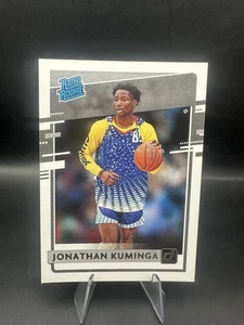 Selecciones del draft de Panini Chronicles 2021 Jonathan Kuminga Donruss clasificación novato #30 radiocontrol - Imagen 1 de 2
