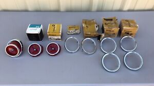 NOS 1965 CHEVY IMPALA TAIL LENS (2)  ASSEMBLY (1) & BEZELS (6) GM CHEVROLET 