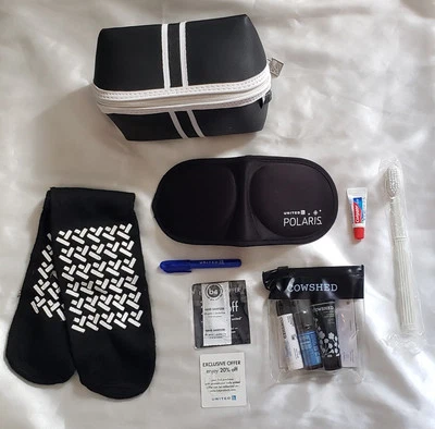 Bolsa de viaje de primera clase Saks Fifth Avenue United Airlines bolsa de amenidades de maquillaje Foto 1 de 4