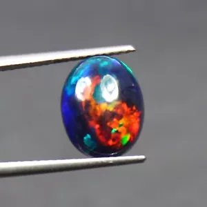 Black Opal Play Of Color Opal Oval Shape Gemstone October Birthstone 11x9x3.7 MM - Picture 1 of 4