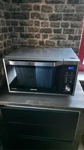 Samsung MC32J7035DS/EG Kombi-Mikrowelle mit Grill und Heißluft 900W 32L - Bild 1 von 4