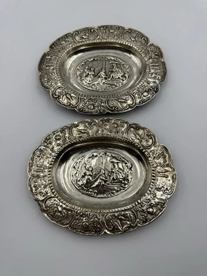 2 platos escénicos alemanes Hanau 800 plateados repoussé • Sin marca • Pseudo sello Foto 1 de 4