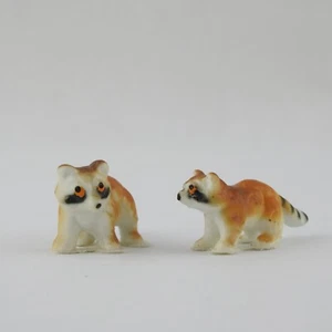 2 Vintage Miniature Hard Ceramic RACOON Animal Figurines Hong Kong 1.5" L Doll - Picture 1 of 6