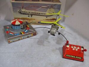 HELICOPTER TRANSPORTER WITH AUTO LOAD IN BOX MADE IN GERMANY WORKS ALL TIN*