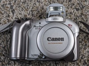 Canon PowerShot S1 IS Digital Camera Silver 3.2 MP *FOR PARTS* Non-Working - Picture 1 of 14