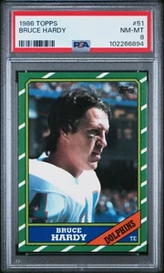 1986 Topps #51 Bruce Hardy PSA 8 casi nuevo-como nuevo Pop 11 solo 49 High Miami Dolphins - Imagen 1 de 2