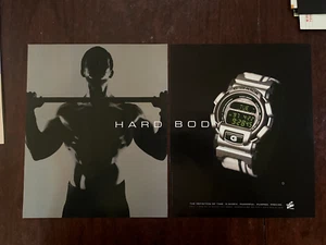 Orologio Casio G Shock 1997 corpo rigido 2 pagine stampa vintage annuncio sollevamento pesi anni 90 - Foto 1 di 1
