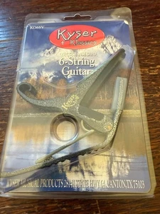 Capo de guitarra de cambio rápido Kyser KG6SV para guitarra de 6 cuerdas, Silver Vein - Imagen 1 de 5