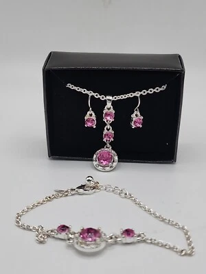 Conjunto de joyería rosa brillante Avon 2014 collar pendientes perforados pulsera Foto 1 de 4