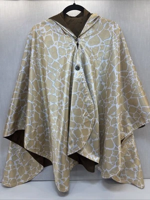 CHAQUETA RAINCAPER REVERSIBLE IMPERMEABLE CAPA DE LLUVIA ANIMAL PRINT MARRÓN CHIC Foto 1 de 4
