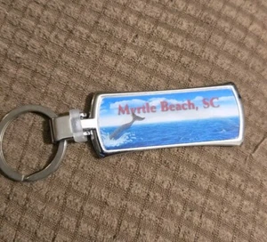 VINTAGE MYRTLE BEACH SC KEYCHAIN 3D MOVING SHORE & DOLPHIN NAME KAITLYN EUC C77 - Picture 1 of 12