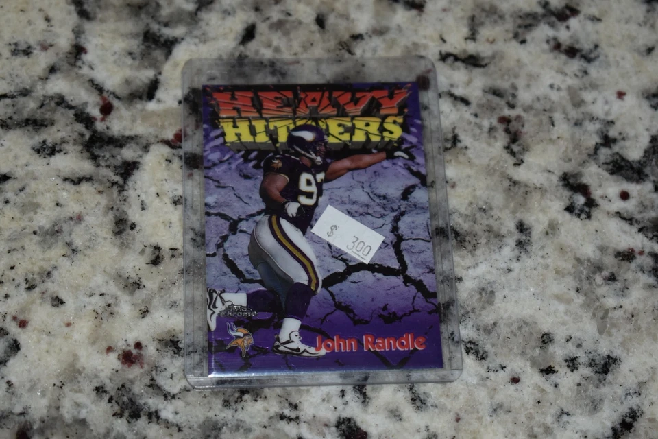 1998 Topps Chrome Football Heavy Hitters Card #18 John Randle  - Image 1 of 1