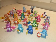 Full set of 1980s Care Bear and Cousin poseables with accessories