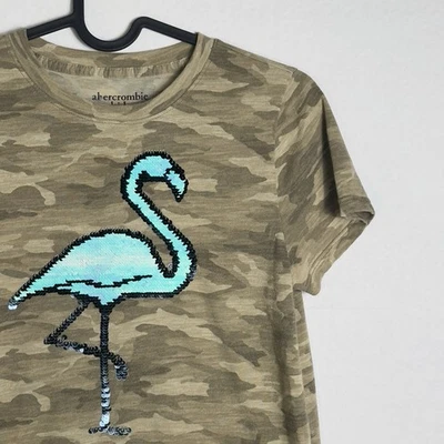 Camiseta Abercrombie Niños Camuflada Talla 11/12 Lentejuelas Flamenco Abatible Gráfico Acristalamiento Foto 1 de 4