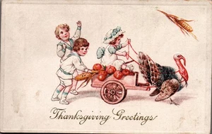 POSTAL ACCIÓN DE GRACIAS SALUDOS NIÑOS CON PAVO TIRANDO DE UN CARRO SERIE 681 - Imagen 1 de 2