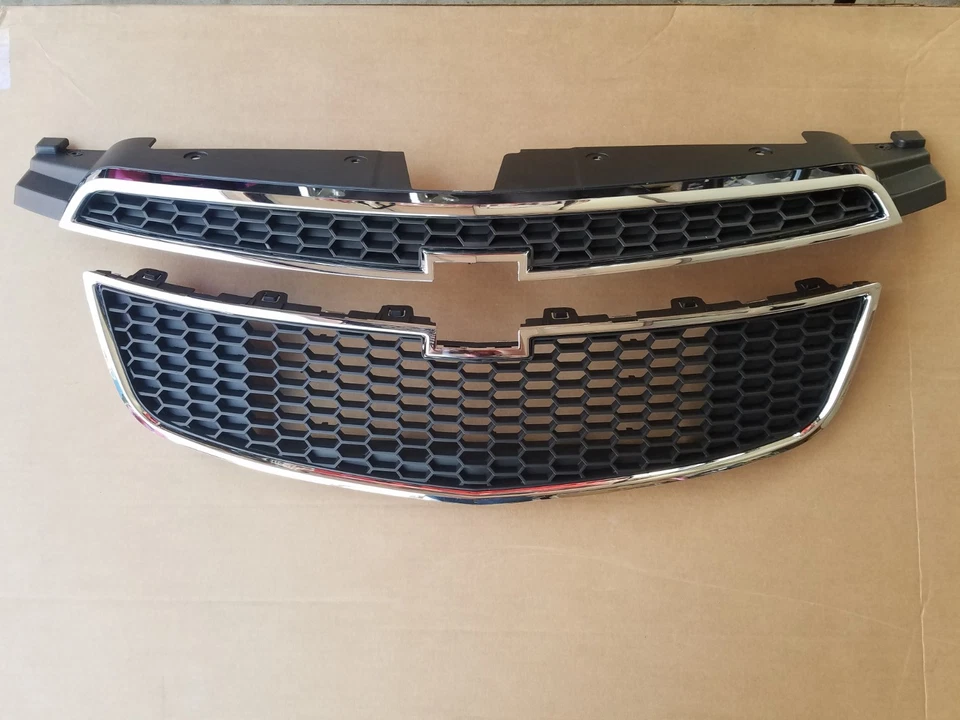 Juego de 2 piezas parachoques delantero Chevy Cruze 2011-2014 parrilla superior e inferior nuevo par Foto 1 de 1