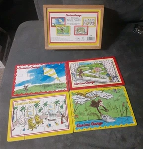 Curious George - 4 Wooden Jigsaw Puzzles - 48 Pieces Total - Schylling  - Picture 1 of 9