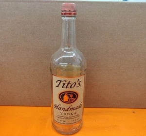 ⭐️⭐️⭐️⭐️ Bottiglia VUOTA 1L Vodka di Tito in vetro trasparente *Multipla disponibile!* - Foto 1 di 5