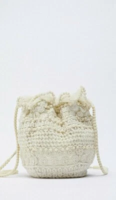 ZARA MINI FABRIC BUCKET BAG Mini fabric bucket bag. Exterior with embroidered - Image 1 of 4