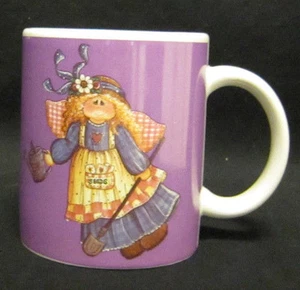 Designpac 10 oz Mug Country Garden Angel on Purple with Watering Can Mindy Cain - Picture 1 of 5