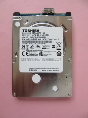 Toshiba 1TB 2.5" USB HDD MQ04UBF100 AZA AE32/ JU0B0U Jan 2025 V7H HDKCD44AZA01 T - Image 1 of 4