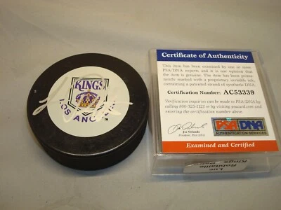 Luc Robitaille Signed Los Angeles Kings Vintage Hockey Puck Auto. PSA/DNA COA 1A - Image 1 of 4