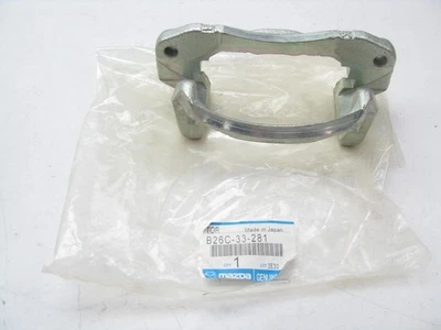 New Genuine OEM Mazda Front Disc Brake Caliper Bracket 99-01 Protege B26C33281 - Image 1 of 3