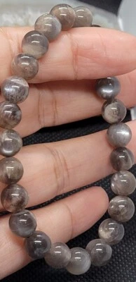 Pulsera de cristal de piedra solar esqueleto negro de 8 mm  Foto 1 de 4