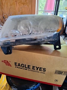 Jeep Grand Cherokee Laredo 2011 Right & Left Halogen Mopar Headlight Assembly - Picture 1 of 3