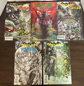 Batman + TMNT fumetto 2-5 e TMNT + libro Ghostbusters - Foto 1 di 7