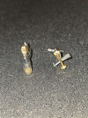 Juego de gemelos dorados y plateados de doble copa de champán para hombre Foto 1 de 3